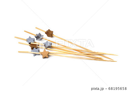 Cocktail picks isolated on white background 68195658