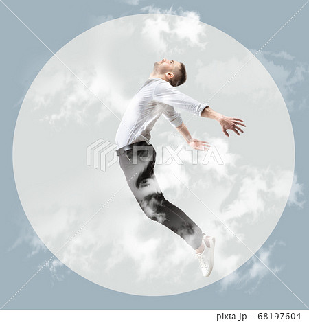 Mid-air beauty. Full length studio shot of attractive young man hovering in air and keeping eyes closed 68197604
