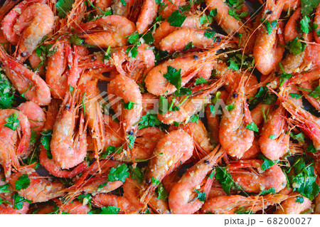Fresh boiled prawns with coriander. A delicious dish of seafood. 68200027
