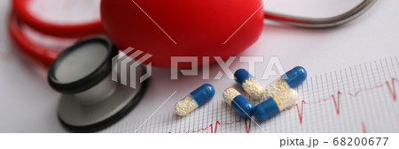 Stethoscope and medicine capsules are cardiogram Stethoscope and medicine capsules are cardiogram 68200677