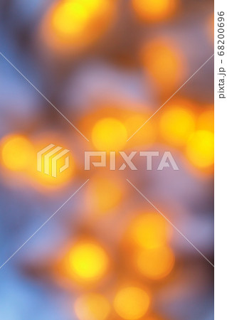 Background from blurry light lights of fir-tree garland on dark. Copy space Background from blurry light lights of fir-tree garland on dark. Copy space 68200696