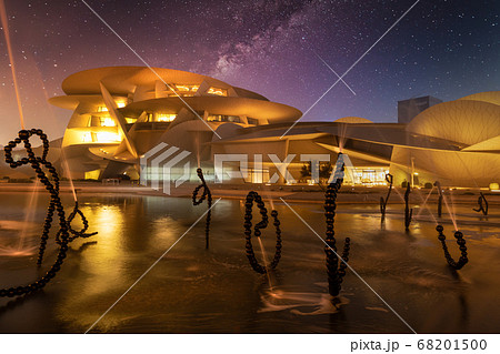 National Museum of Qatar (Desert rose) exterior  night view with fountain in foreground 68201500