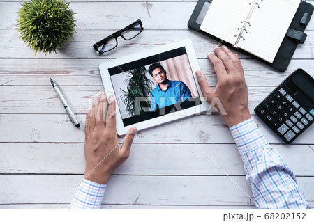 businessman working in video conference, close up. 68202152
