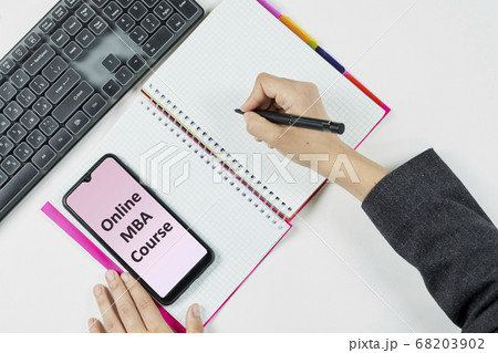 Online MBA course. Woman learning at home Online MBA course. Woman learning at home 68203902