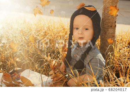 Portrait of 2-3 years old child in autumn garden 68204017