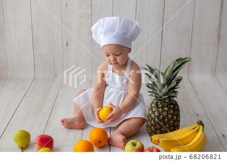 One year old baby. Little chef. 68206821
