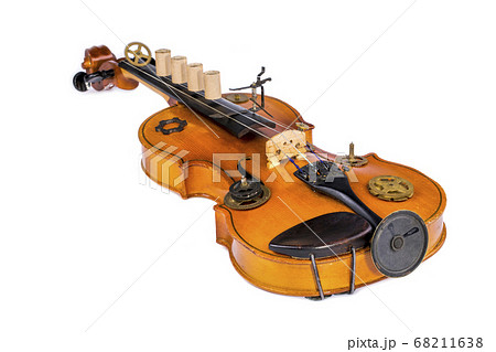 Violin with speaker and clockwork parts on white background 68211638