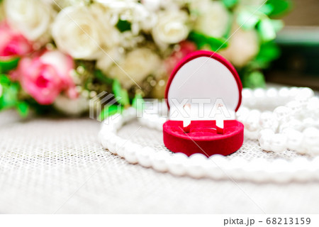 Wedding rings on the background of the wedding 68213159