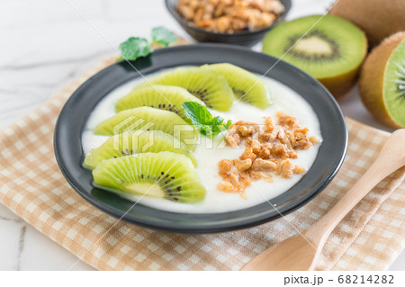 yogurt with kiwi and granola yogurt with kiwi and granola 68214282