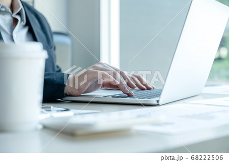 Businesswoman calculating financial graph showing results in the office Businesswoman calculating financial graph showing results in the office 68222506