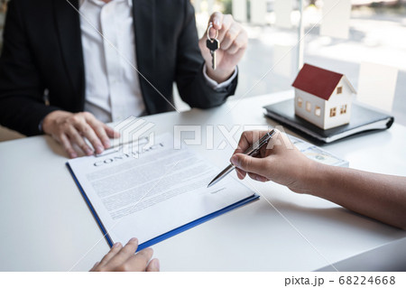 Real estate agent are presenting home loan and Real estate agent are presenting home loan and 68224668