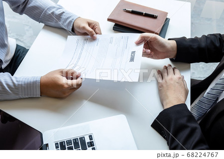 Businessman interview consider a resume 68224767