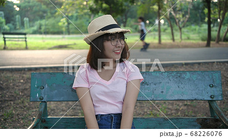Tourism concept. An Asian girl is sitting and 68226076
