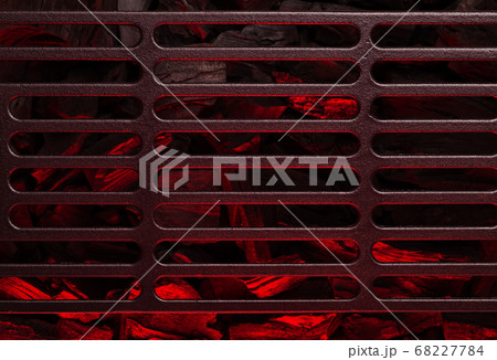 Metal barbecue grill over hot coal 68227784