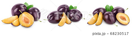 fresh purple plum and slices with leaves isolated on white background with clipping path and full depth of field. Set or collection 68230517