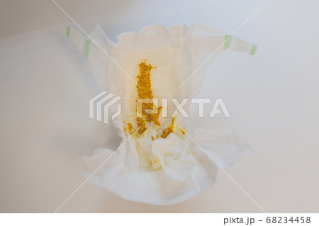 Baby diaper stained feces Newborn nappy dirty shit in toilet. 68234458