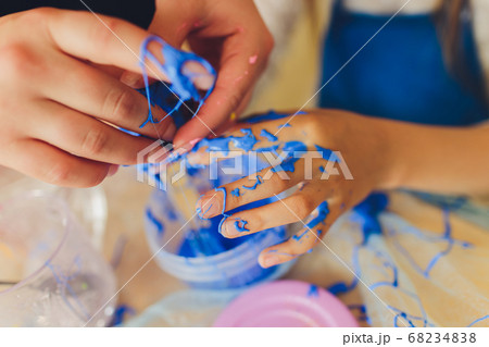 Ingredient for make home made Toy Called Slime, Teenager having fun and being creative homemade slime. Selective focus on Slime. Ingredient for make home made Toy Called Slime, Teenager having fun and being creative homemade slime. Selective focus on Slime. 68234838
