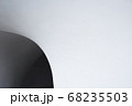 A hole in a white concrete wall. Close up side view 68235503