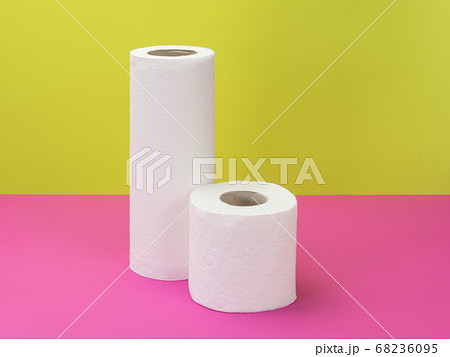 Paper towel and toilet paper on a bright 68236095