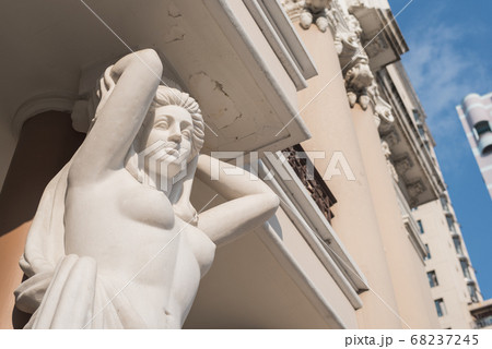 Woman statue of the facade of Municipal Theatre of Ho Chi Minh City (built in 1899). Also known as Saigon Municipal Opera House. Colonial architecture Woman statue of the facade of Municipal Theatre of Ho Chi Minh City (built in 1899). Also known as Saigon Municipal Opera House. Colonial architecture 68237245