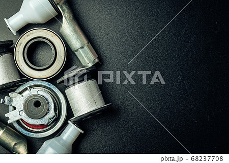 Metal car engine spare part on black background 68237708