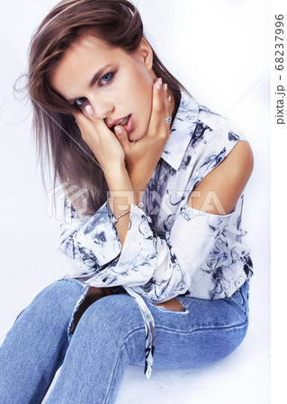 young pretty hipster girl posing emotional happy smiling on white background, lifestyle people concept 68237996