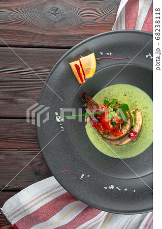 Fish Fillet with fried vegetables garnish and chutney Fish Fillet with fried vegetables garnish and chutney 68238118