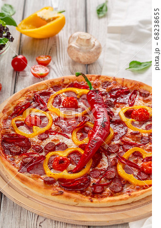 Homemade cheese pizza with salami. creative photo. 68238655