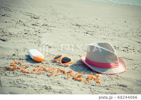 Word summer, sunglasses, sun lotion and straw hat Word summer, sunglasses, sun lotion and straw hat 68244066