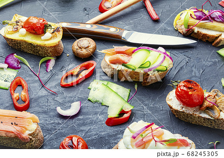 Italian bruschetta with vegetables. Italian bruschetta with vegetables. 68245305