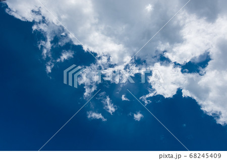 floating white cloud in bright blue sky in sunny day 68245409