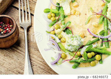Hummus and variety of vegetable 68246072