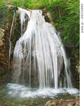 Waterfall Jur-Jur in Crimea water motion in spring Waterfall Jur-Jur in Crimea water motion in spring 68250860