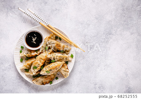 Fried dumplings gyoza with soy sauce Fried dumplings gyoza with soy sauce 68252555