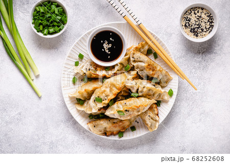 Fried dumplings gyoza with soy sauce Fried dumplings gyoza with soy sauce 68252608
