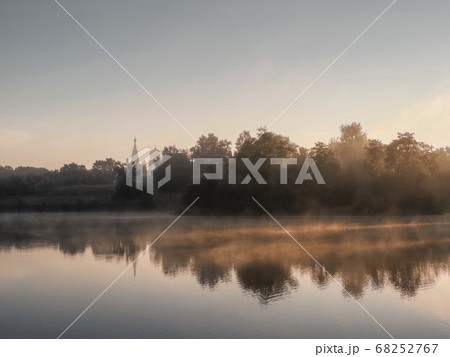 Beautiful morning landscape with fog over the lake 68252767