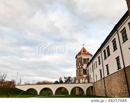 Tall steeples and towers, the roof of an old Tall steeples and towers, the roof of an old 68257088