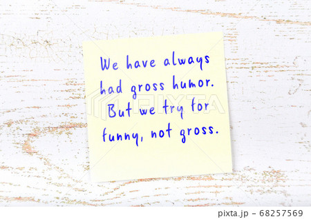 Wise quote on sticky note on wooden wall  68257569