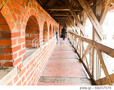 Large long old brick balcony with red brick Large long old brick balcony with red brick 68257574