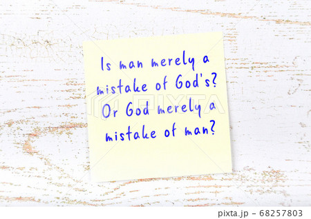 Wise quote on sticky note on wooden wall  68257803