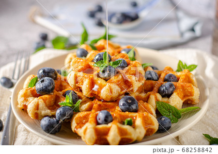 Homemade waffles with berries 68258842