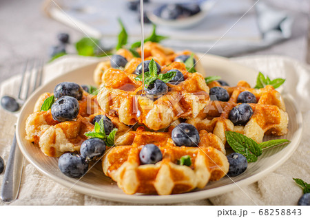 Homemade waffles with berries Homemade waffles with berries 68258843