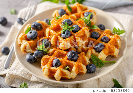 Homemade waffles with berries Homemade waffles with berries 68258846