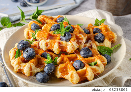 Homemade waffles with berries Homemade waffles with berries 68258861