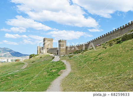 View of the path to the fortress on the green rock 68259633