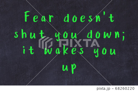 Chalk wise inscription on black chalkboard Chalk wise inscription on black chalkboard 68260220