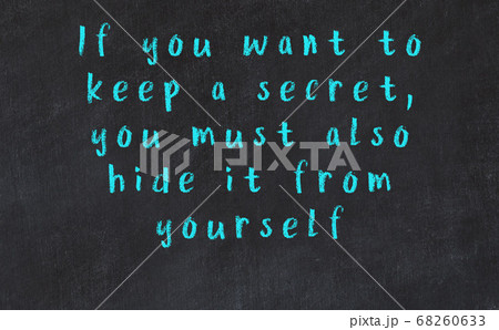 Black chalkboard with wise inscription on it 68260633