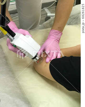 A cosmetologist, a specialist doctor, conducts A cosmetologist, a specialist doctor, conducts 68261825