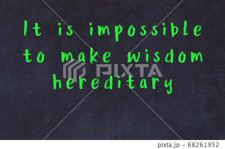 Black chalkboard with wise inscription on it 68261952