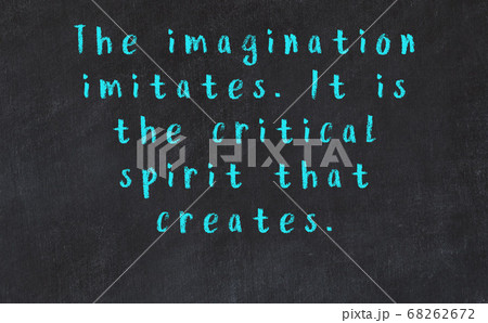 Chalk inscription of smart quote on black desk 68262672